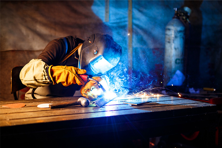 Welding of a piece of rail with special tools.